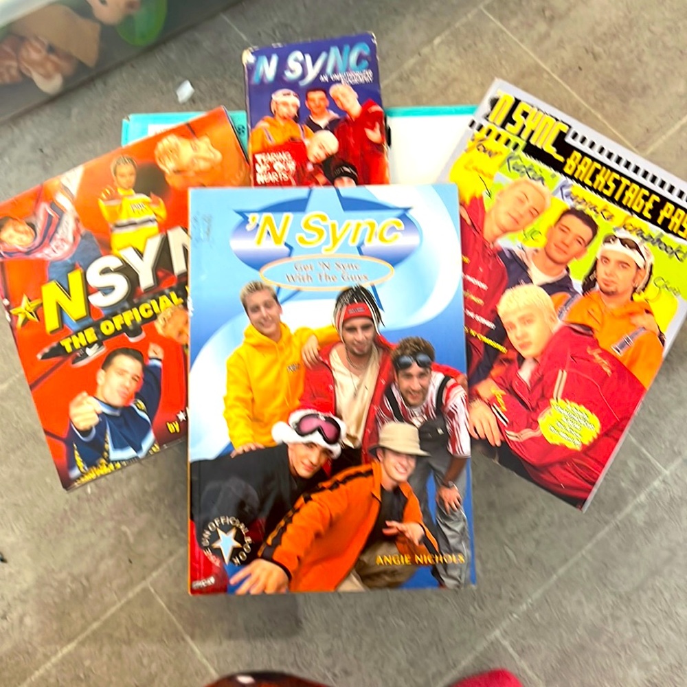 3 magazines and a book about NSYNC